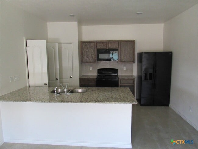 Photo - 6102 Harriet Tubman Ave Townhome