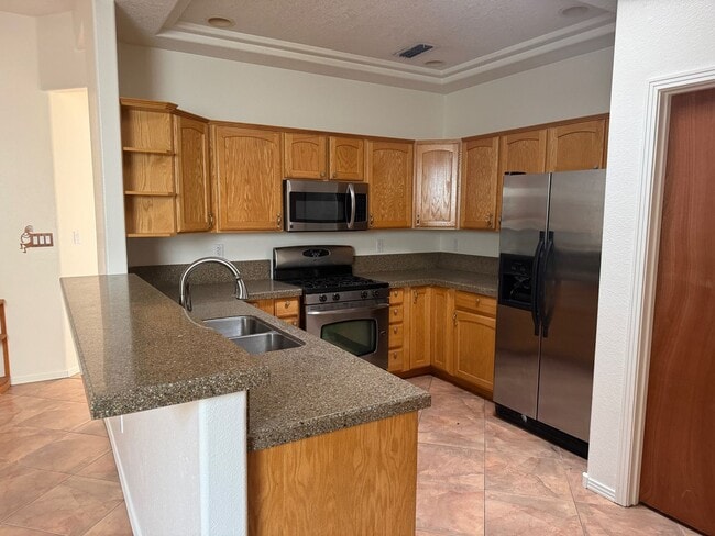 Photo - Location, Location! 3 Br, 2 Ba, fireplace in living room, lawn service included