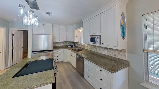 Photo - NO HOA! Wrap around porches, 1 block to the beach!