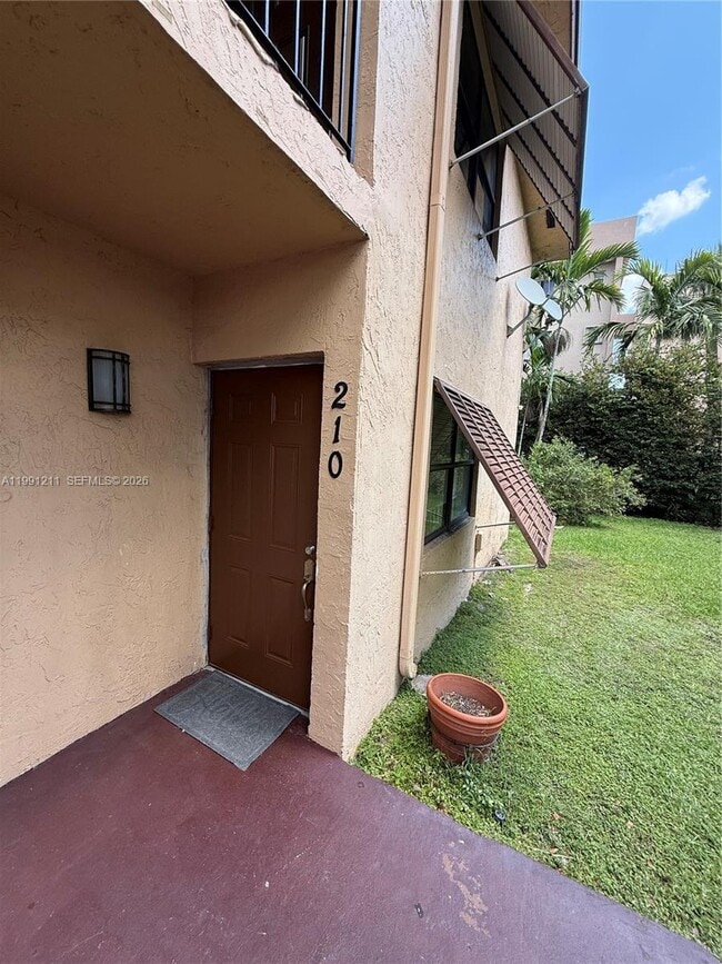 Building Photo - 6854 NW 173rd Dr Unit 210