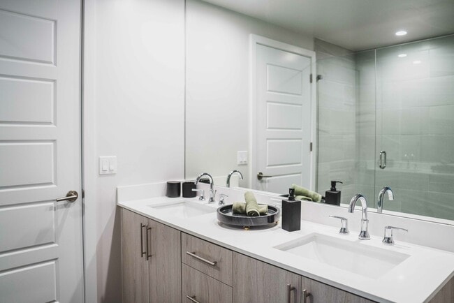 Serene bathrooms with spa-like soaking tubs or tiled shower.