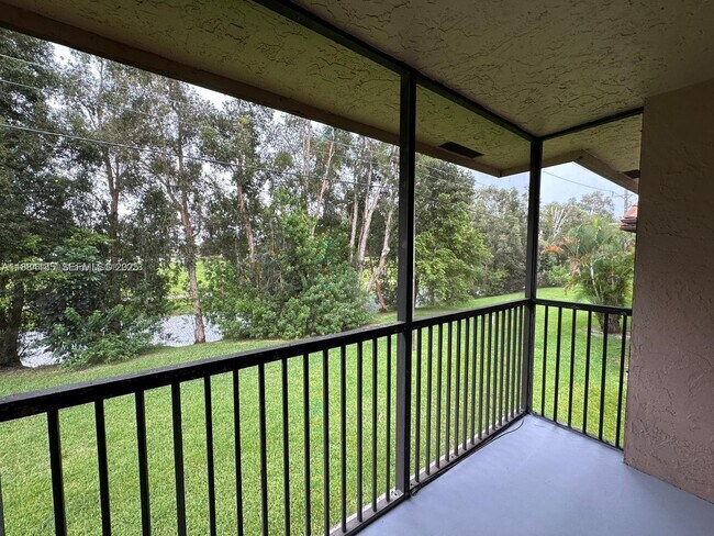 Building Photo - 10453 NW 11th St Unit 206