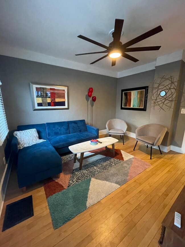 Living room with large flat screen tv - 1506 N Jefferson St House
