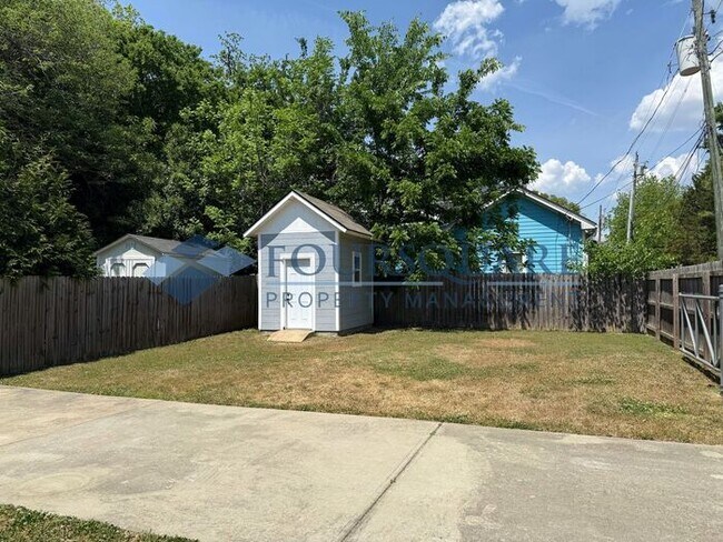 Photo - Modern 3-Bed / 2.5-Bath Home with Granite Kitchen, Fenced Yard & Private Balcony – Walkable to Do...