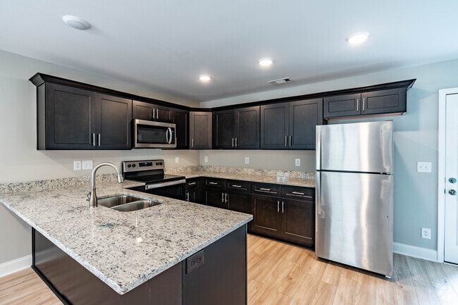 East Adams Townhomes - East Adams Townhomes