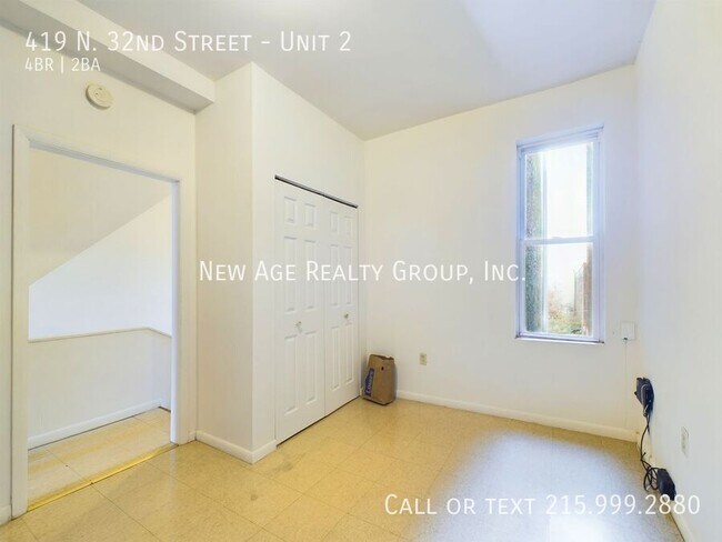 Photo - Spacious, Bi-level Apartment Available at ... Unit 2