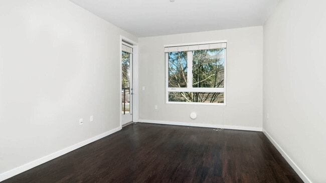 Living Room with Balcony and Hard Surface Flooring