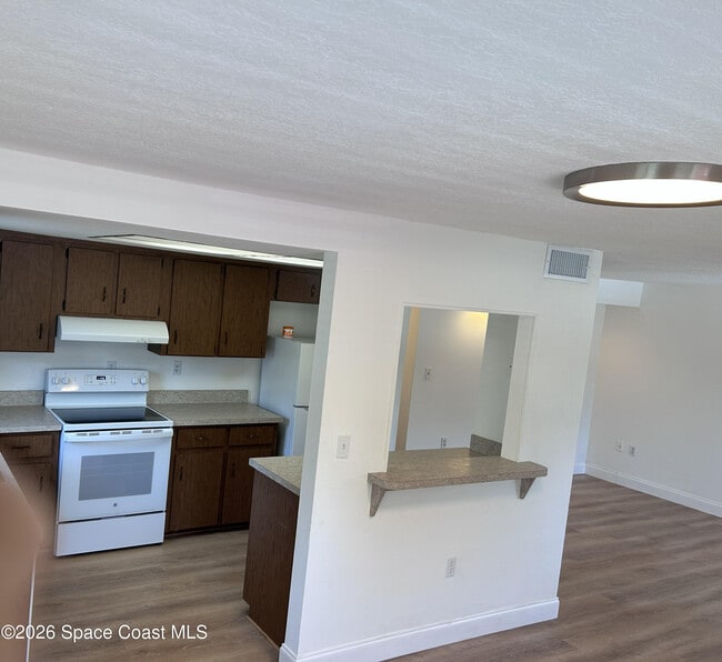 Photo - 201 Cocoa Isles Blvd Unidad 1