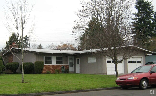 Building Photo - Tadjo1 Unit 202 Rental