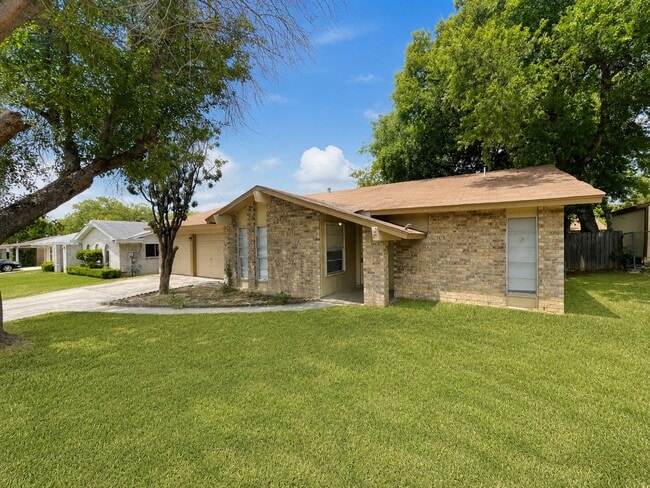 Photo - Spacious single-story rental offering 3 bedrooms, 2 full baths and approximately 1,405 square fee...