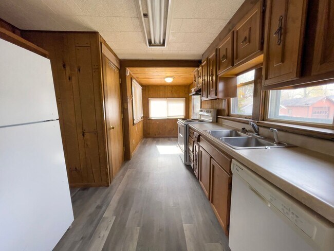 Photo - PRELEASING for AUGUST! Convenient Campus Living | 4BR with Fenced Yard & Covered Parking
