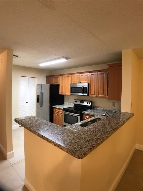 Photo - 11229 W Atlantic Blvd Unit #102