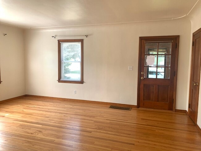 Photo - Three bedroom home with beautiful hardwood floors and central air!