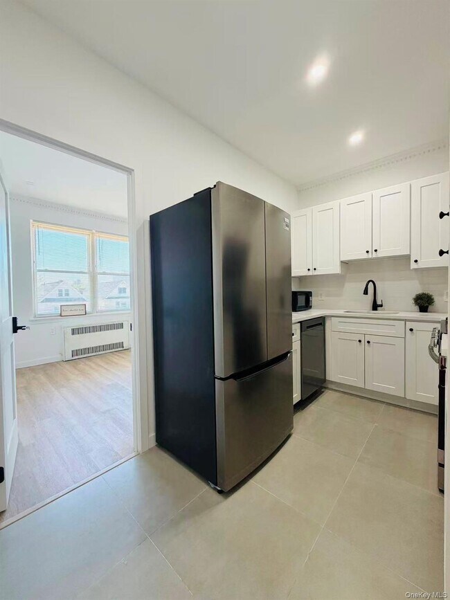 Photo - 60-24 Wetherole St Unit 3rd Fl.