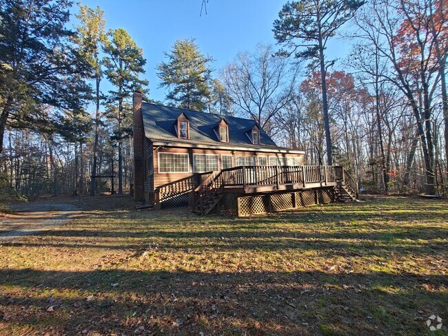 Building Photo - # bedroom home nestled in the woods