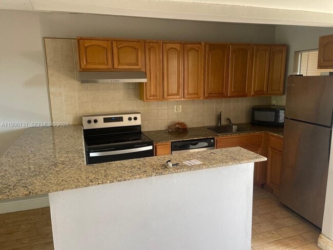 Photo - 4111 Stirling Rd Unidad 504