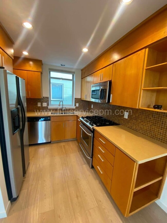 Photo - Modern Queen Anne Townhome w/ Dedicated Office, Fenced Patio, Lofted Primary Suite & Oversized Ga...