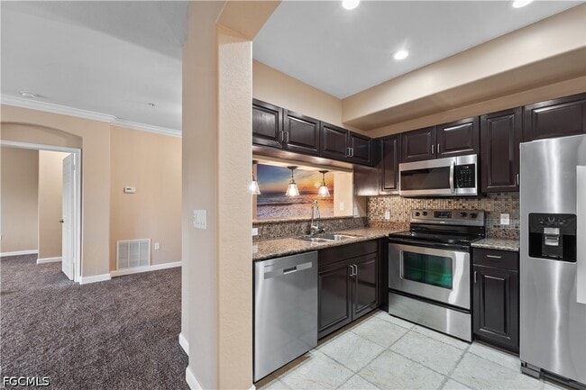 Building Photo - 13141 Bella Casa Cir Unit 3177