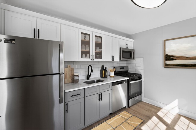 Unveil the modern charm of Eagle Rock Apartments at Woodbury. This stunning kitchen features sleek stainless appliances, elegant cabinetry, and ample space for culinary creativity. Elevate your living experience today—schedule a tour and see for yourself!