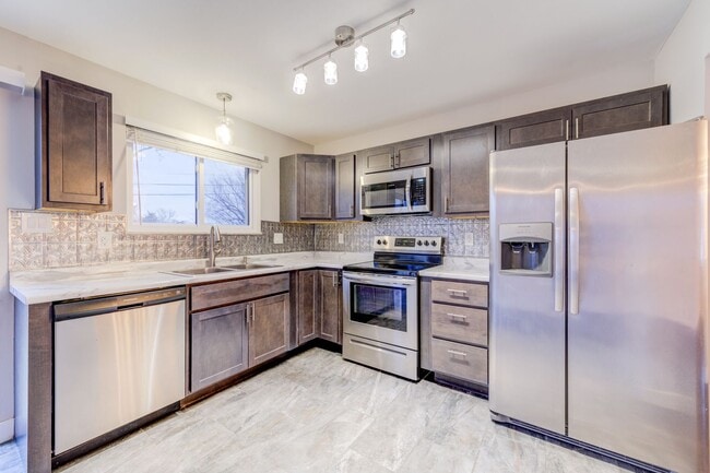 Building Photo - Updated, pet friendly 4 bedroom 1.5 bath in the Fox C-6 school district. Unit 2320