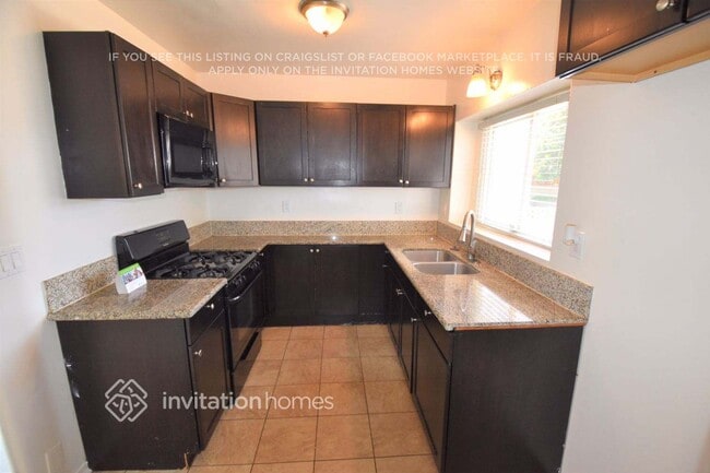 Photo - 8947 S Denker Ave