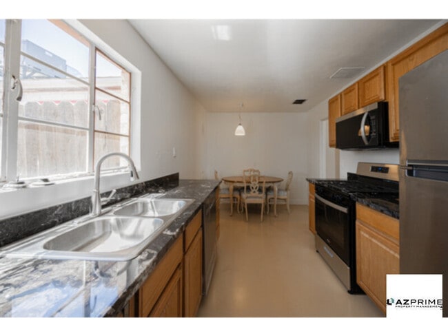 Photo - Welcome to this Charming 2/1 Phoenix Duplex Unit!