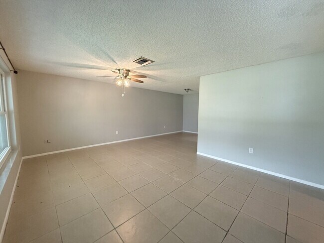 Photo - "Charming 3-Bed Oasis with 2 Full Baths in New Port Richey – Your Perfect Retreat Awaits!"