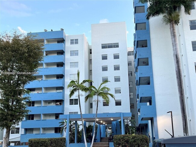 Building Photo - 5050 NW 7th St Unit PH6