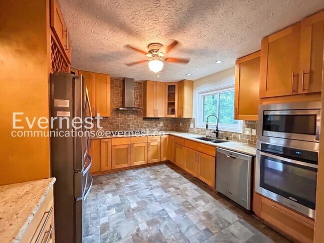 Photo - Beautiful 4 Bed/3 Bath Home with 3 Car Garage / Available Now!