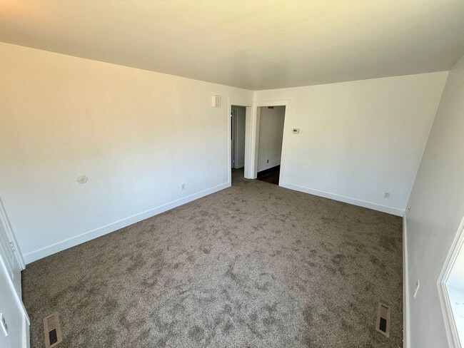 Photo - For Rent: 2 Bedroom, 1 Bathroom Home with Garage and Large Yard