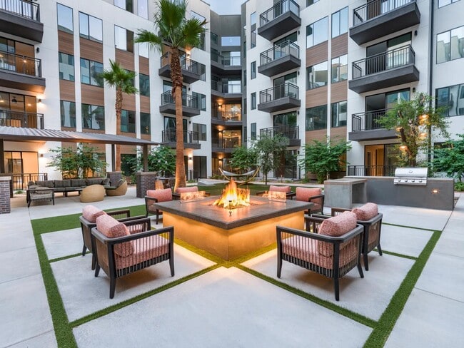 Enjoy the cozy courtyard with friends or solo—featuring firelight, greenery, and grilling stations for a perfect open-air retreat.
