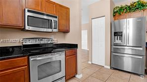 Building Photo - 8899 NW 107th Ct Unit # 208 Rental