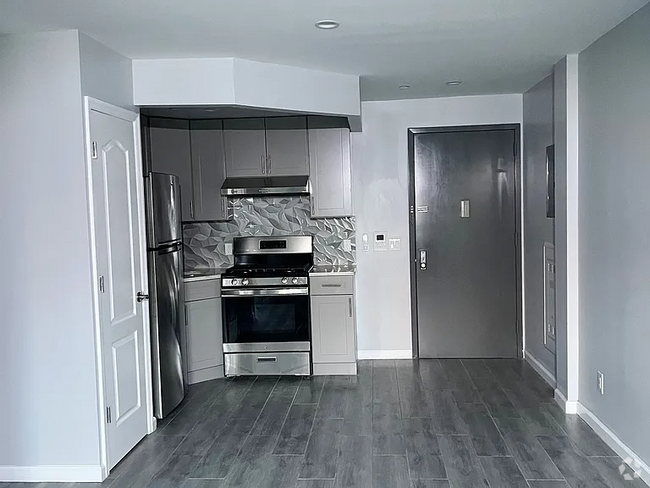 Building Photo - 7302 Woodside Ave Unit C Rental