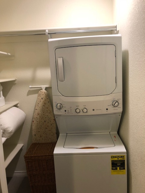 Laundry machine dryer combo, ironing board, laundry basket, linen/storage space - 9416 E 51st Dr Apartamentos