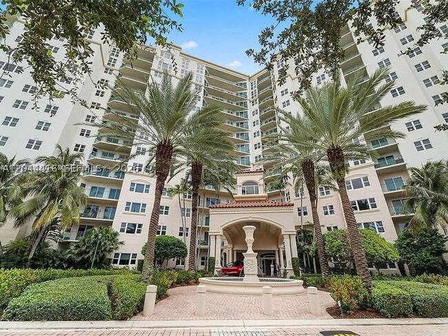 Building Photo - 19900 E Country Club Dr Unit 318