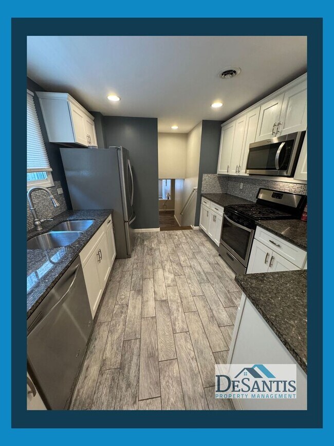 Photo - Spacious 4-Bedroom Home with Classic Charm & Modern Touches!