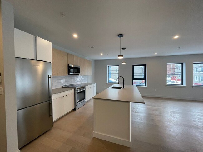 Photo - New construction condo available now!