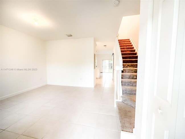 Photo - 1486 SE 26th Ter Unit key gare