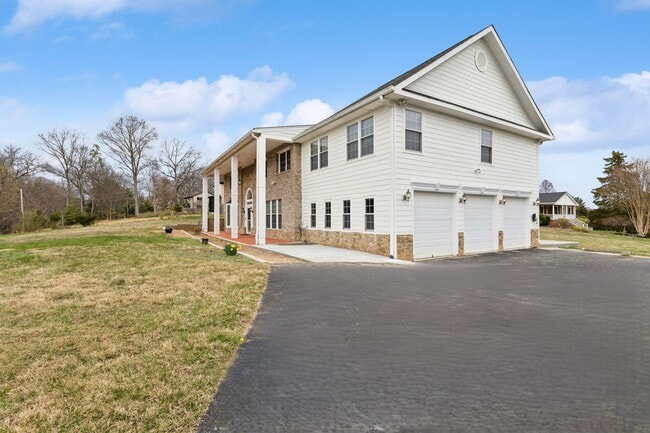 3 Car Garage and Generous Driveway! - 10828 Miller Rd