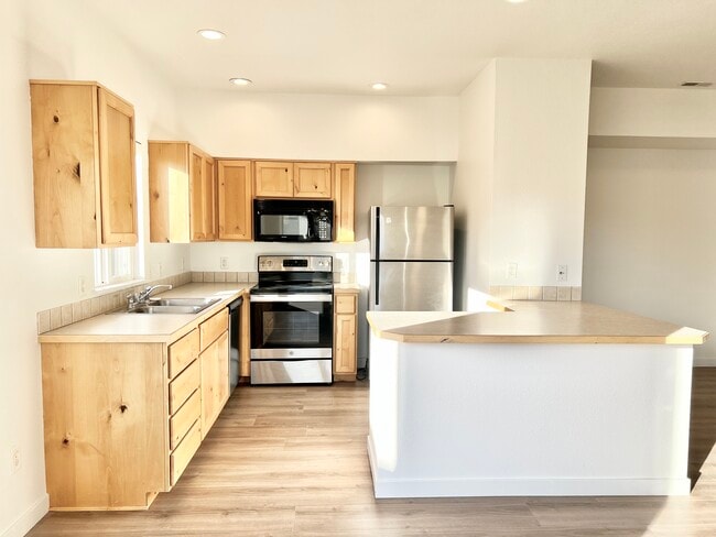 Kitchen (View from Dining Area) - 139 N Plummer Rd