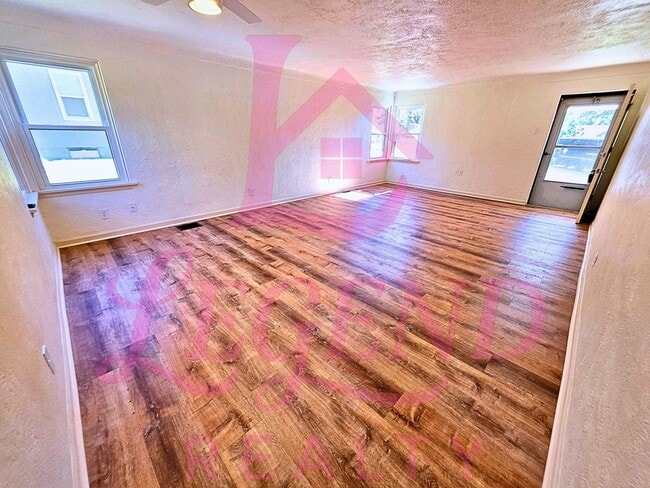 Photo - Charming 3-Bedroom with Huge Yard & Covere...