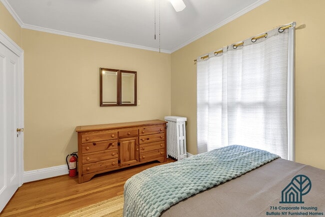 Photo - Furnished 4-Bedroom, 2.5-Bath Apartment near Elmwood Village Unit 1