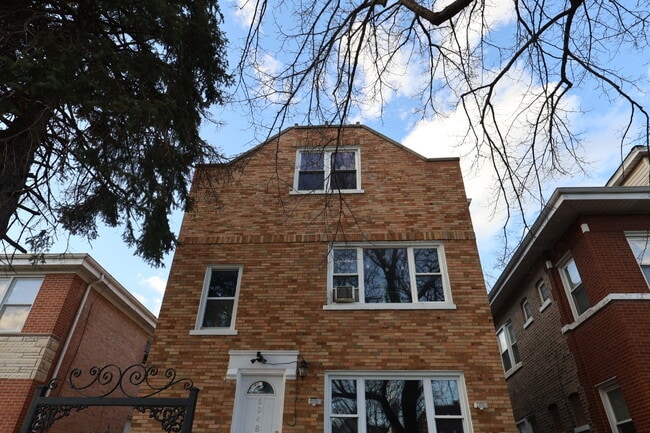 Building Photo - 5048 W Henderson St Unit 2R