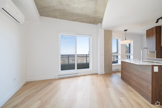 1BR, 1BA - 589SF - Living Room - Le Loyal – condos locatifs