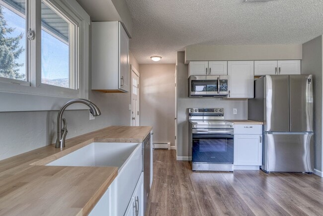 Photo - Beautifully renovated three bedroom with l...