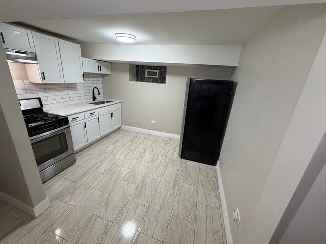 Photo - 7503 W 64th St Unit B