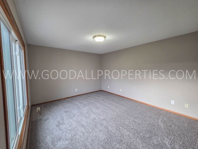 Photo - Beautiful 4-Bedroom Home in Johnston – with Finished basement and bonus room and a fenced yard.