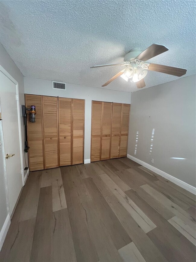 Building Photo - 6075 N Sabal Palm Blvd Unit 314 Rental