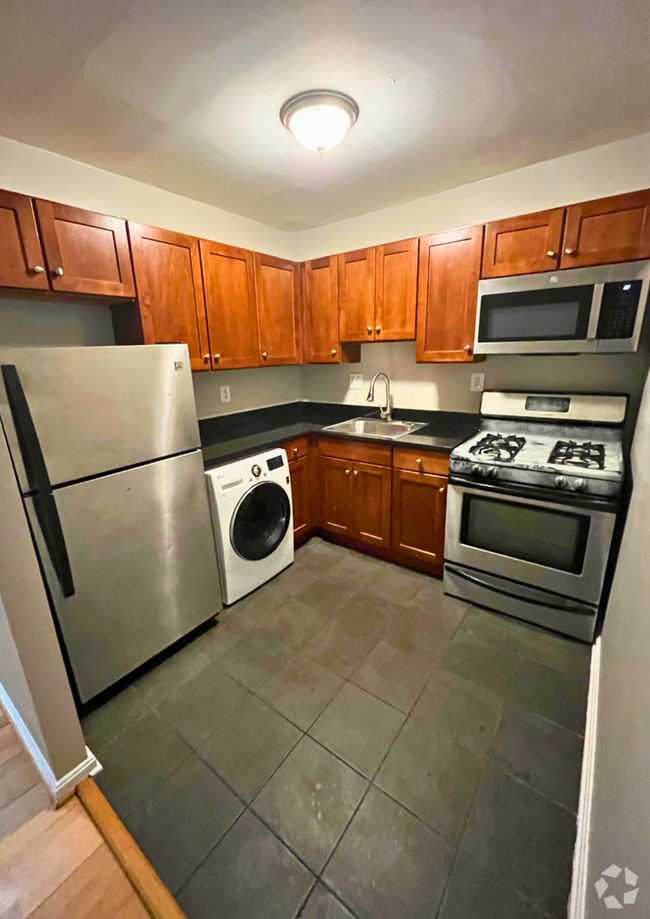 Building Photo - NEWLY AVAILABLE - RENOVATED 2 BR Unit 201 Rental