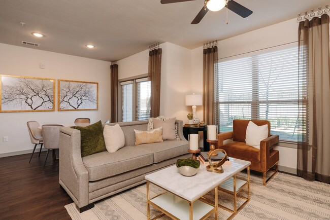 Modern Living Room with Large Windows - Los Robles Apartments